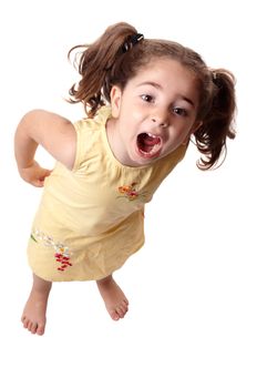 A little girl standing and shouting