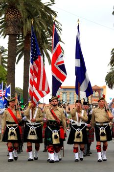 VENTURA, CA, USA - October 11, 2009 - Bagpipe bands participating in a parade at the Ventura Seaside Highland Games October 11, 2009 in Ventura, CA