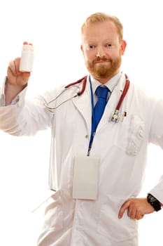 Hospital worker holding a blank bottle of pills, vitamins, pharmaceuticals ready for a label or text.