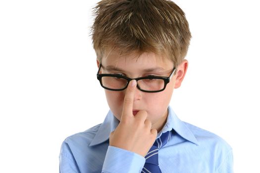 A child pushing his glasses up with a finger