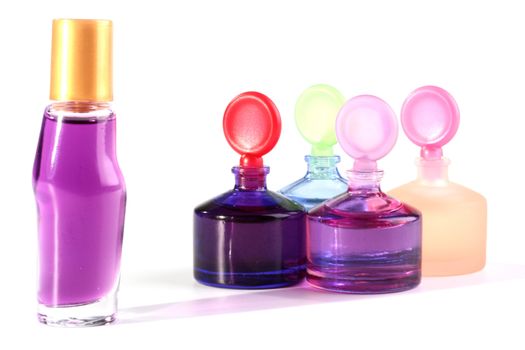 Small bottles with cosmetics for care of a face skin and hands.