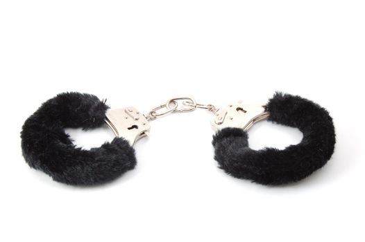 some handcuffs isolated on a white background