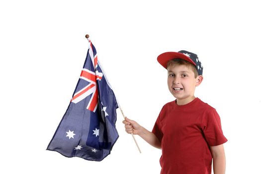 Young boy holding an Australian flag in his hand.