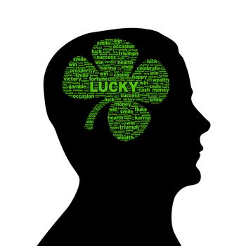 Silhouette head with a clover plant on white background.