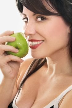 A beautiful smiling woman eating a fresh green apple. 
eg - health, diet, nutrition, sin, temptation, etc...