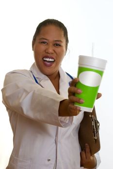 Healthy life, healthy choices.   Ethnic doctor, nurse or dietician, holding a fresh juice