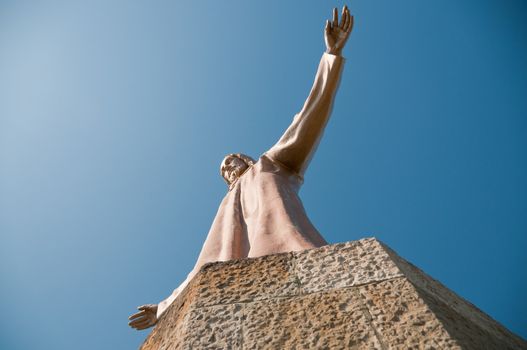 Shot of statue on the blue sky in Spain