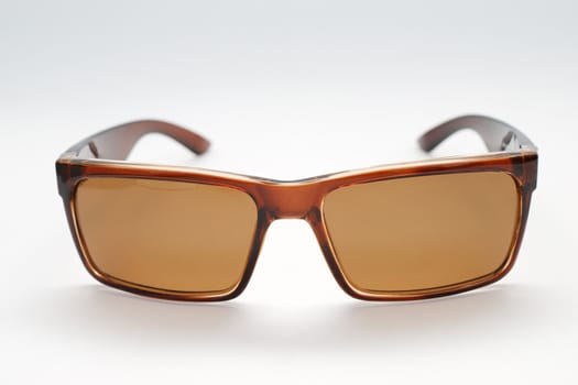 Brown sunglasses isolated on white background