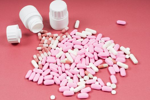 Studio shot of pills on red backgroung