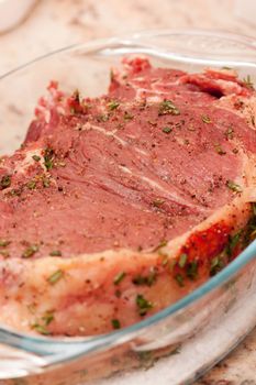 Delicious prime rib marinated with herbs and spices ready to be cooked