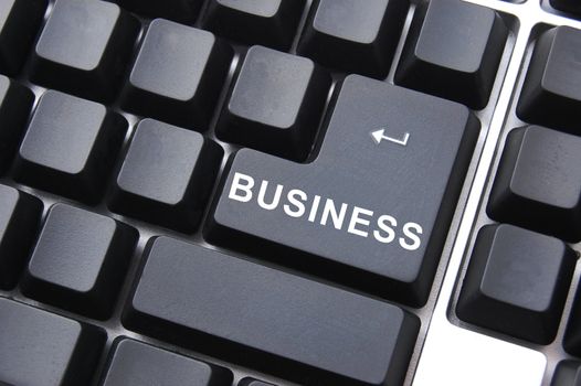 computer keyboard with business enter button in black