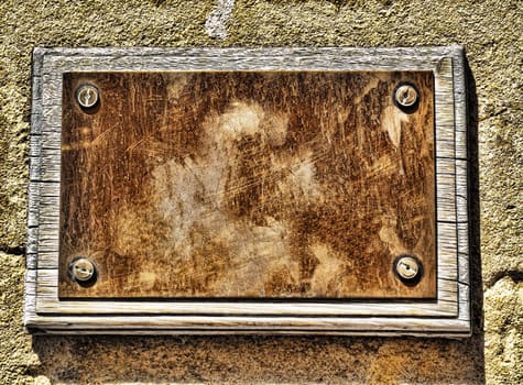 Vintage street sign on an old wall with copy space