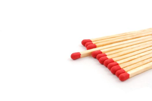 Some red matches isolated on a white background.