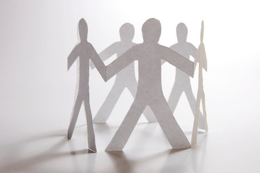 paper man showing concept for business teamwork and love