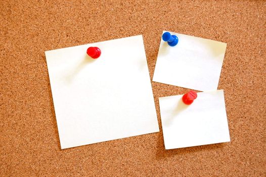 blank and empty sheet paper with pin on bulletin board