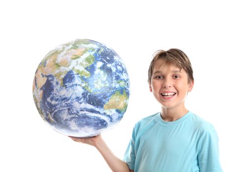 A smiling, cheerful boy student holding the world earth in the palm of his hand.
