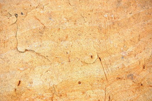 texture of a sandstone rock with reddish surface