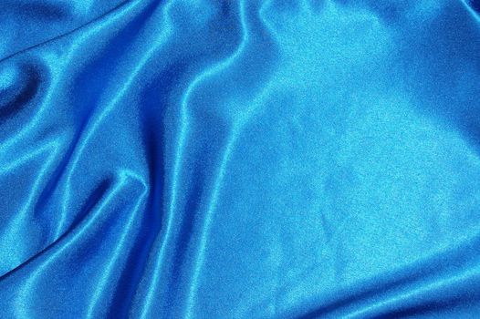 blue satin or silk background with textile texture