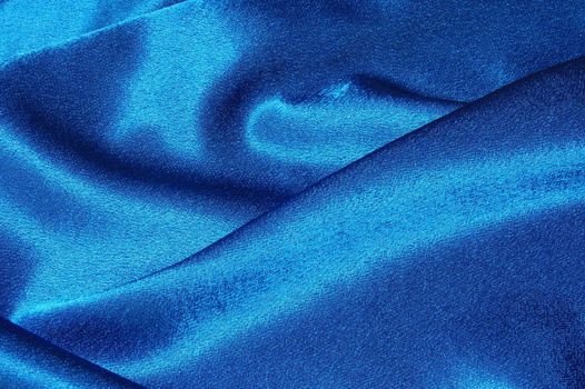 blue satin or silk background with textile texture