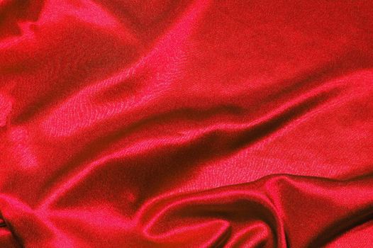 red satin or silk background with textile texture