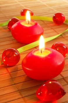 romantic red candles showing spa or love concept