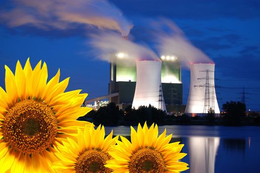 save the nature concept with sunflower and oil power plant