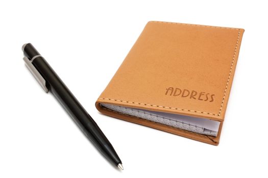 Pen and address book isolated