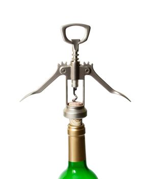 Corkscrew with extracted cork and a bottleneck isolated on white