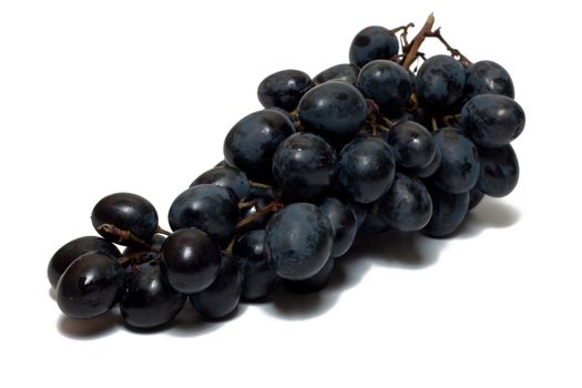 Bunch of grapes of red wine isolated on white
