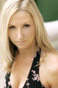 Young girl woman with smokey eyes and blonde hair.