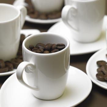 cups with coffee beans