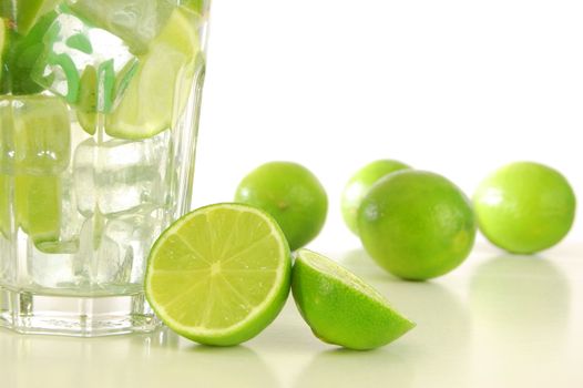 cocktail or lemonade with sliced lime fruit