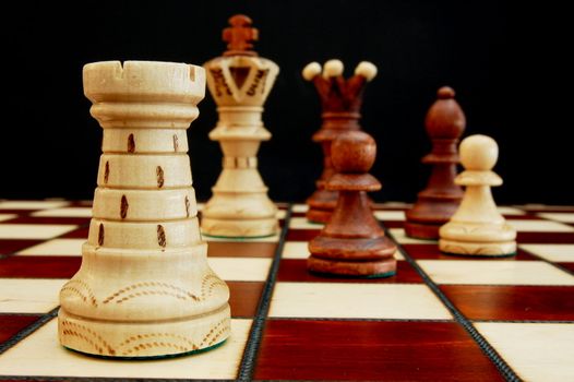 chess pieces on chess board showing concept for success and power