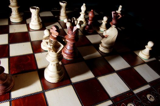 chess pieces on chess board showing power and success
