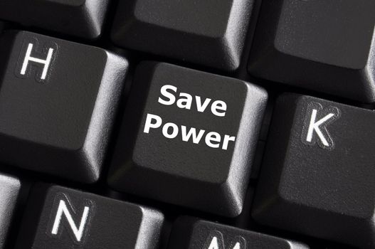 save power or energy concept with key on computer keyboard