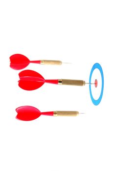 successful dart arrow hit the target or the objective or goal