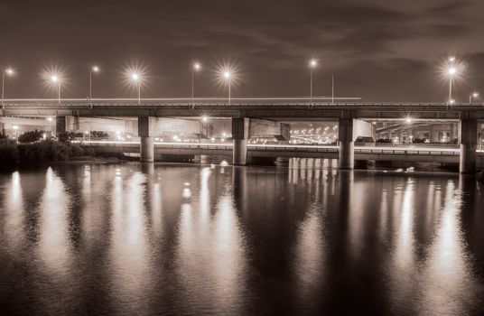 Bridge on the river in the evening of Taipei city night.