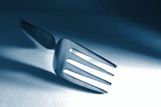 abstract fork macro in the kitchen as a food concept