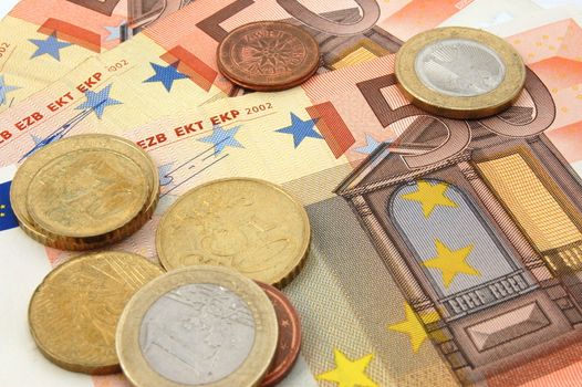 macro of euro bills and coins can be used as background