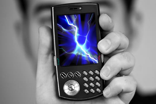 A man holds a cell phone with a lightning bolt illustration on the screen.  Great image to illustrate cell phone radiation.