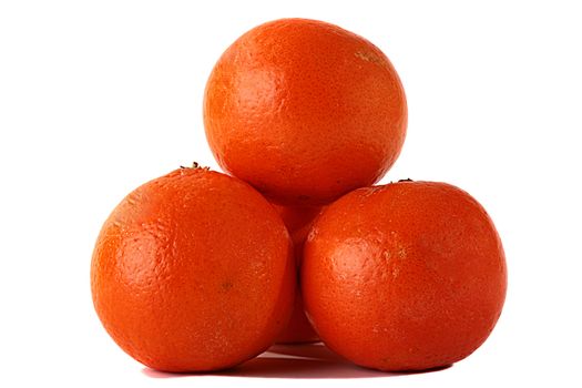 Four tangerines are collected in a small group on a white background.
