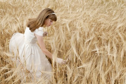 communion dress girl in the field