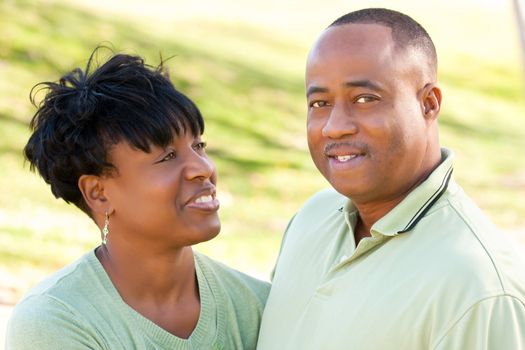 Attractive Happy African American Couple Posing in the Park.