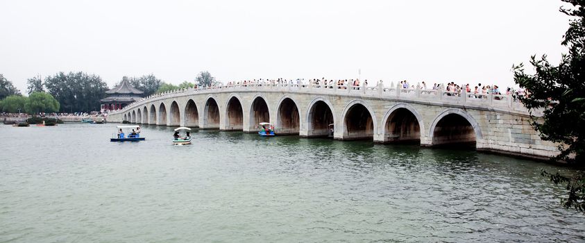 Famous 17 arch lion bridge in the Summer Palace near Beijing, China. 
