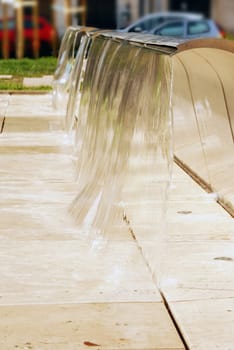 modern fountain with falling water in Budapest, Hungary