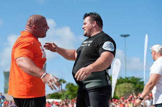 CANARY ISLANDS - SEPTEMBER 03: Ervin Katona (l) and Arno Hams (r) during Strongman Champions League in Las Palmas September 03, 2011 in Canary Islands, Spain