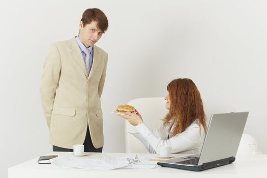 Two businessmen at office during a lunch break