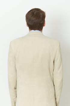 The young man in a light jacket - the rear view