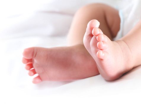 Little baby feet with copy space