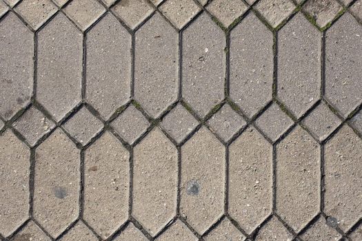 Closeup Detail of Diamond Cement Pattern in Sidewalk